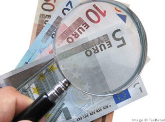 euros with magnifying glass
