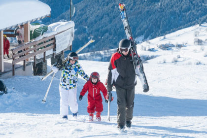 Family skiers at Saint-Francois Longchamp, French Alps