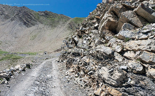 Rocky mountain track leading to tunnel, below the Col du Parpaillon