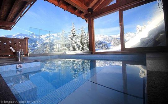 Alpine Infusion's luxury Chalet Genepi pool with a view