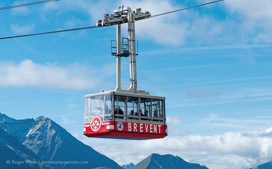 Side view of Brevent cable car with mountains in background above Chamonix