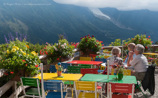 View of family on the terrace f the Chalet de La Floria above Chamonix