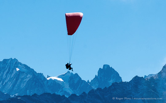 Side view of parapente experience with mountain backdrop above Chamonix