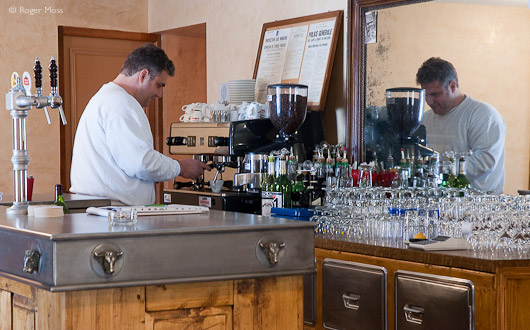 Franck Patelli prepares un café noir at the beautifully-restored Café Pension de Savoie in Abondance.