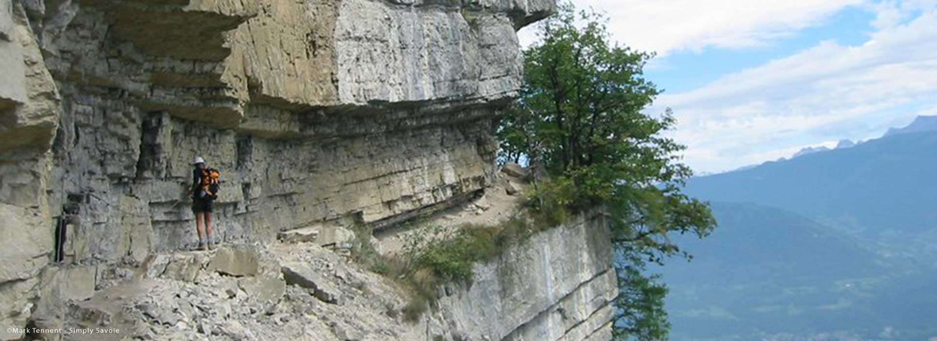 Via ferrata with views below, French Alps