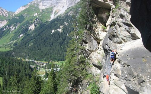 high view of via ferrata and landscape below, French Alps