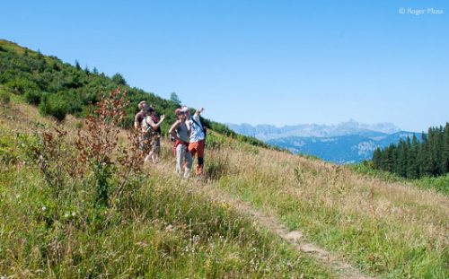 Walkers looking at the view, Les Saisies, French Alps