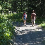 Couple enjoy forest walk at Les Saisies