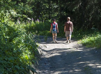 Couple enjoy forest walk at Les Saisies