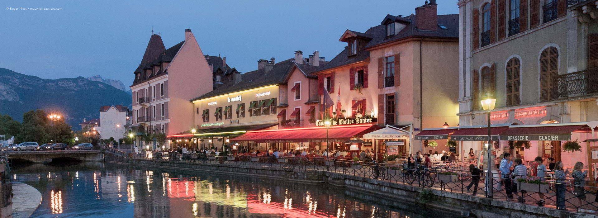 Evening view of quayside bars and restaurants in Annecy