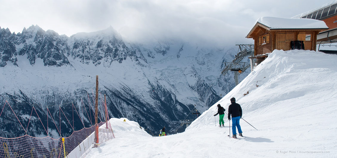 Skiers joining piste above Chamonix.