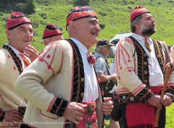 Singers in traditional costume during transhumance festival, French Pyrenees.