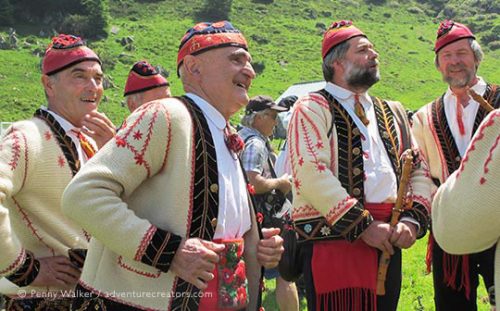 Singers in traditional costume during transhumance festival, French Pyrenees.