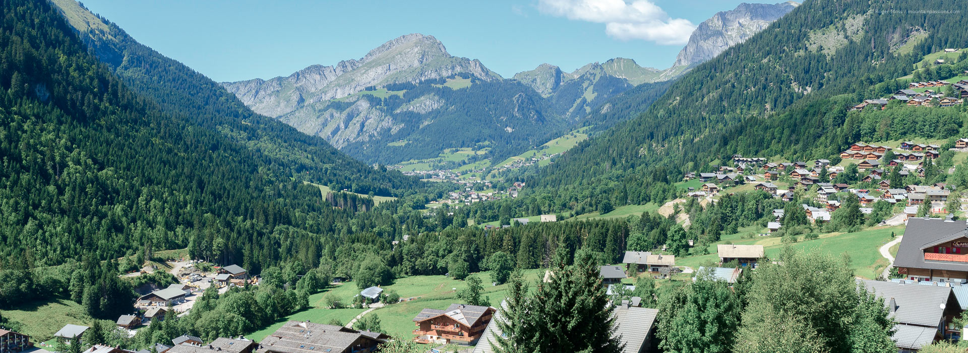 Wide overview of Chatel village and valley with mountains