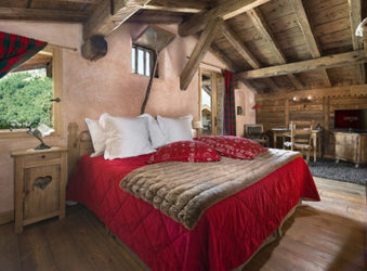 Hotel La Bouitte luxury bedroom in Alpine chalet, St Martin de Belleville, French Alps