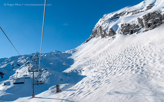 View of ungroomed ski terrain from chairlift above Avoriaz, Portes du Soleil, French Alps.