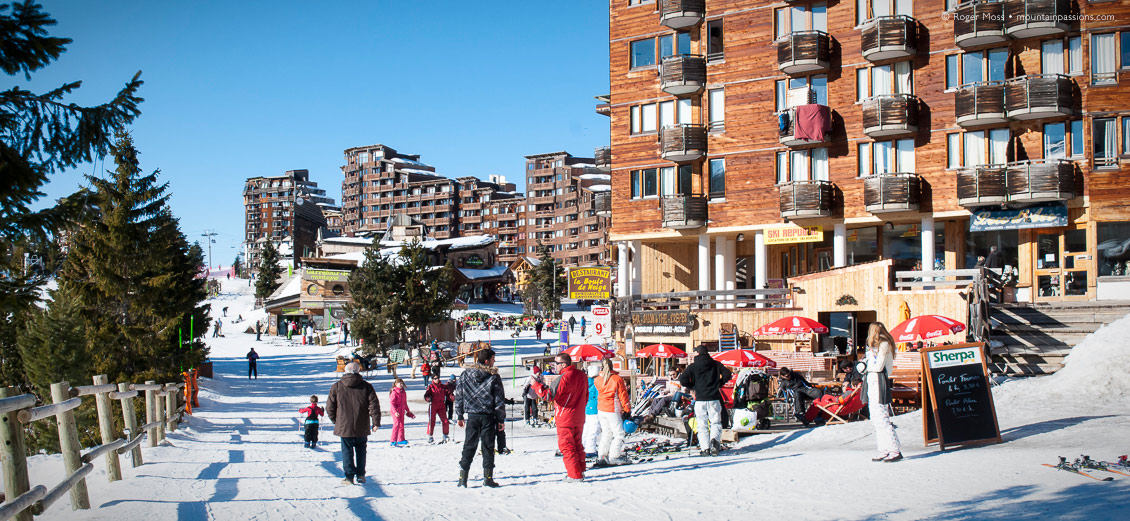 Skiers and other visitors with ESF ski instructor in Avoriaz, Portes du Soleil, French Alps.