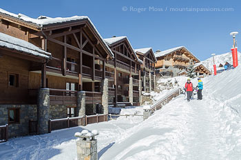 Skiers returning to slopeside apartments at Sainte Foy Tarentaise, Savoie, French Alps.