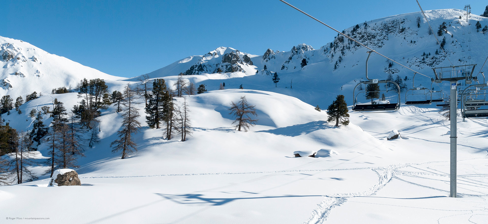 Fresh snow and natural mountain scenery seen from ski lift