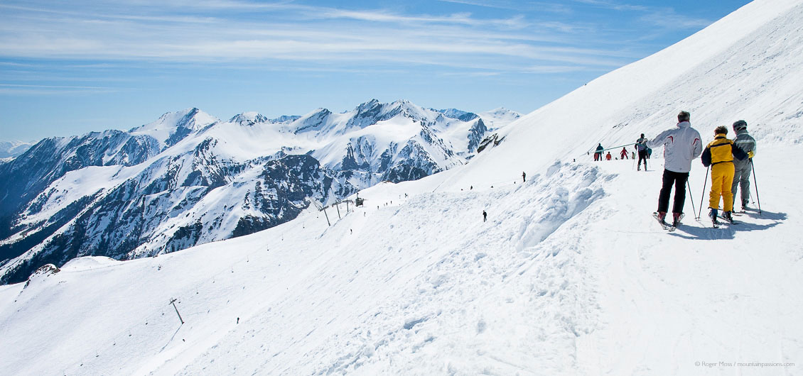 Skiers looking at mountain scenery above Piau Engaly ski resort