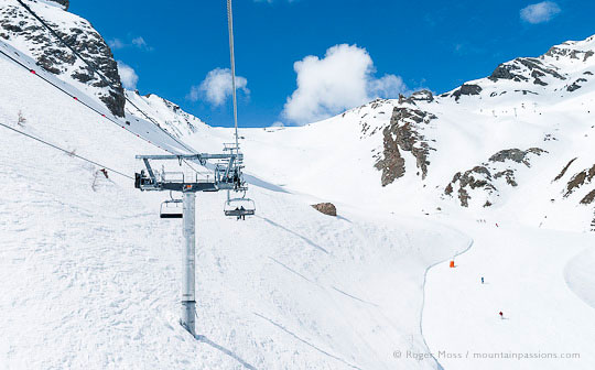 Skier's view from chairlift of pistes