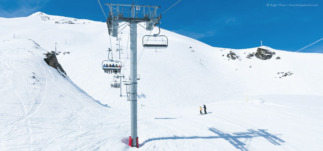 Chairlift and skiers at Piau Engaly, French Pyrenees