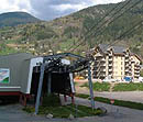 Saint Gervais gondola lift with Le Grand Panorama in the background.