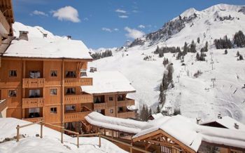 Le Village de Lessy exterior with view to ski area, Le Grand Bornand, French Alps