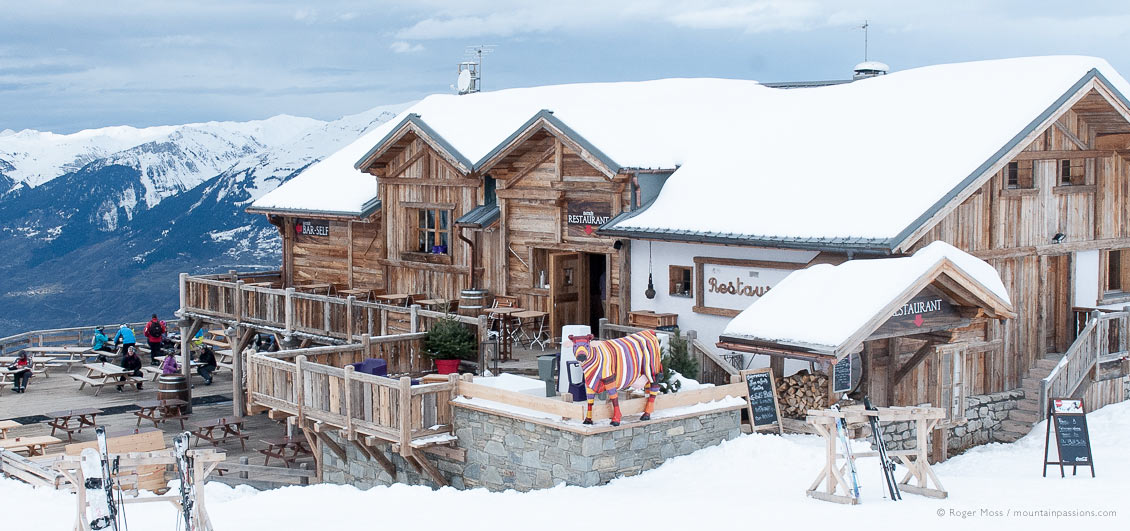 Overview of chalet-style mountain restaurant at Les Arcs