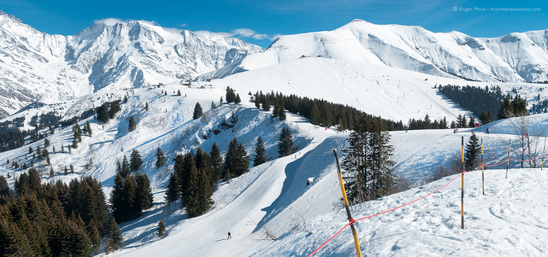 Wide view of ski terrain with Mont Blanc at Saint Gervais