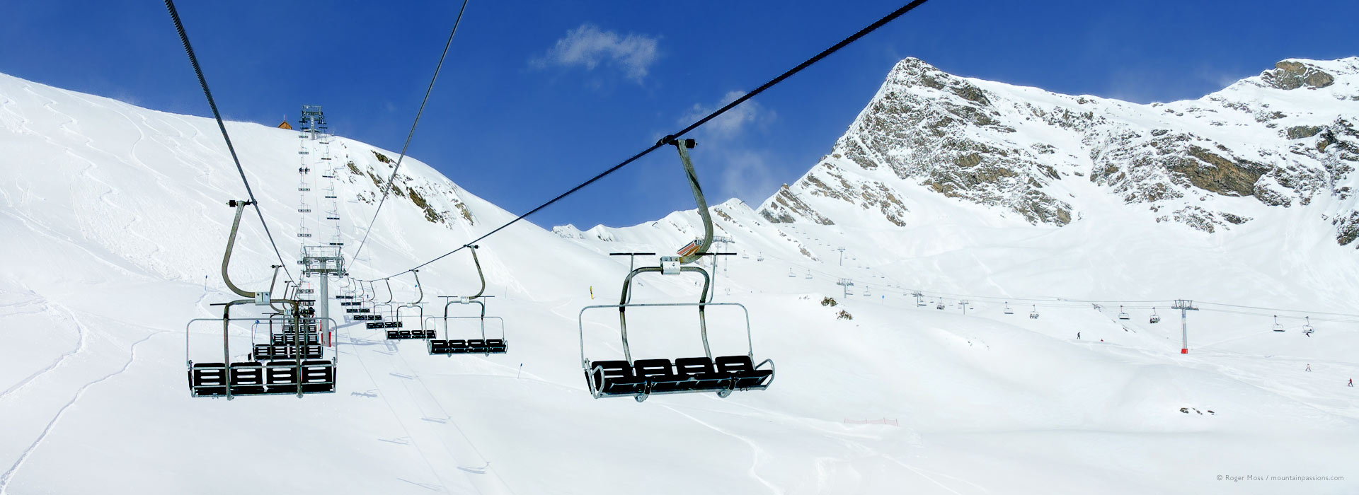 Wide view from chairlift of mountains above Cauterets ski resort.