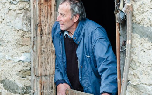 Award-winning cheese-maker Jean-Pierre Blanc in the doorway of his high-altitude chalet in the Beaufortain