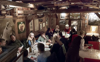 High interior view of traditional Savoyard restaurant with diners