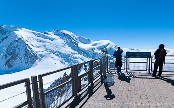 Visitors looking at Mont-Blanc from observation deck, Aiguille du Midi, above Chamonix, French Alps.