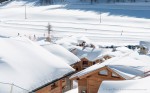 The Obelisque area accommodation rooftops with snow, Montgenevre, French Alps