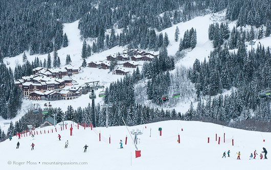 Skiers above Valmorel, Tarentaise, French Alps