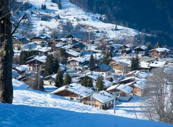 Crest Voland village with snow on rooftops