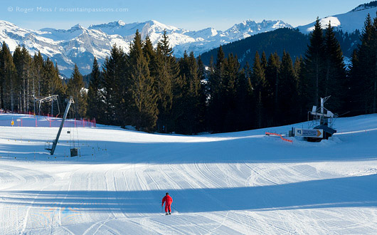 Skier on wide piste at Crest Voland, Espace Diamant.
