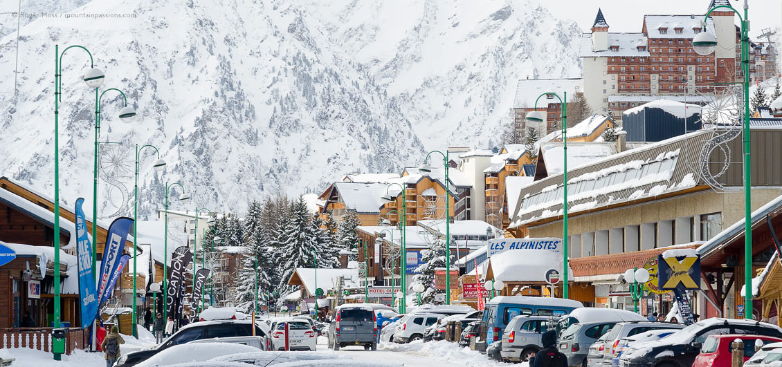 View of Les 2 Alpes ski resort village centre after snowfalls.