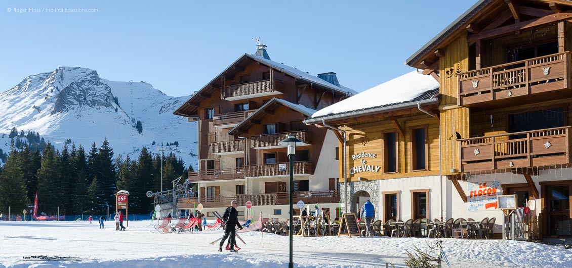 Wide view of front de neige, Praz de Lys ski village, French Alps.