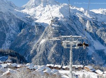 Overview of Sainte-Foy Tarentaise ski village from chairlift, Savoie, French Alps.