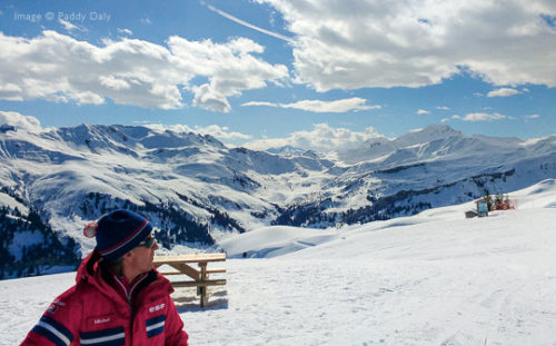 ESF ski instructor and mountain scenery, Areches-Beaufort, French Alps