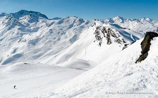 Skier on piste above Saint Martin de Belleville