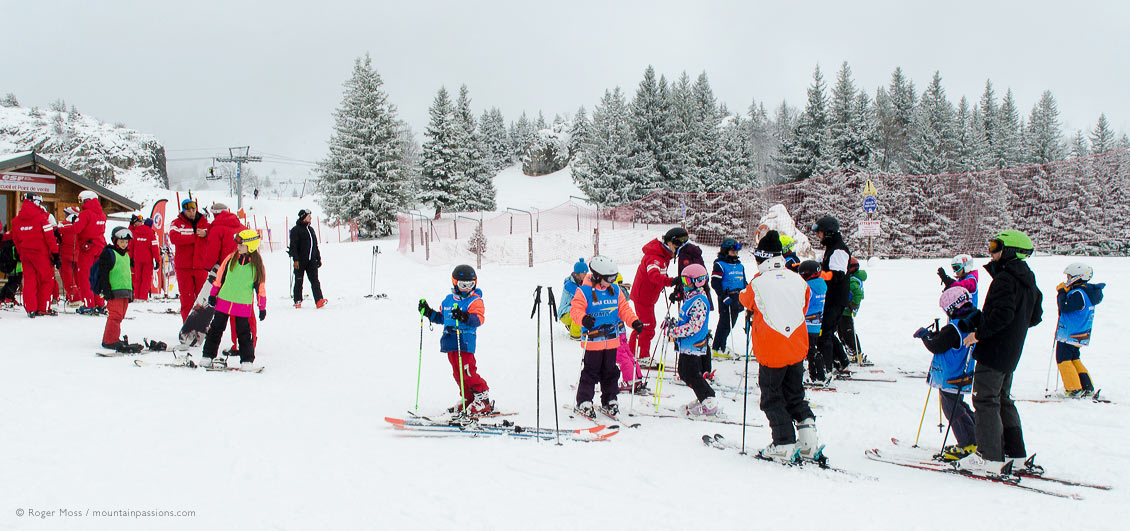 Families gathering at ski school on mountains at Villard de Lans